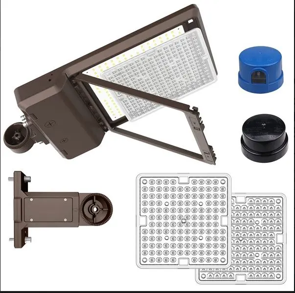 [74701D] 74701D  120-277V Type III Installed 200/240/300W 3K/4K/5KBronze 40,555	A modern design with customizable features, this Area Light efficiently & effectively brightens outdoor areas Wattage Selectable Color Selectable: 3000K/4000K/5000K Field Changeable Lens: Type III Installed Type IV & V Included in box Twist Lock Receptacle & Shorting Cap Included Photocell Included MORRIS